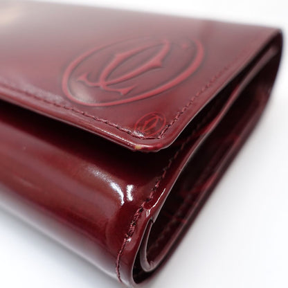 【中古】CARTIER カルティエ 二つ折り財布 ハッピーバースデー コンパクトフラップウォレット パテントレザー ボルドー レディース /181942