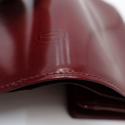 【中古】CARTIER カルティエ 二つ折り財布 ハッピーバースデー コンパクトフラップウォレット パテントレザー ボルドー レディース /181942