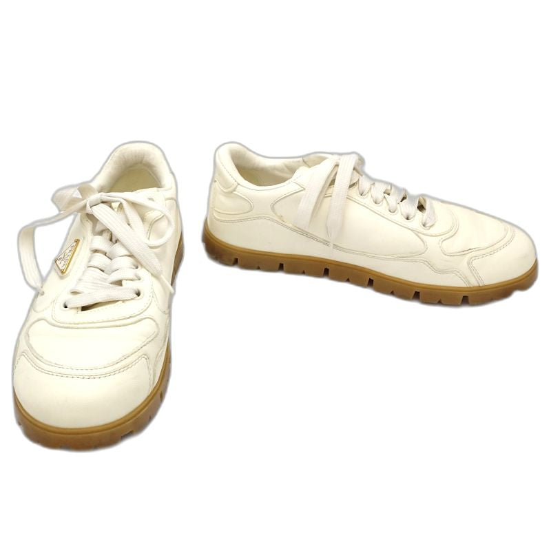 PRADA プラダ スニーカー ローカット トライアングルロゴ 1E709N サイズ38 レザー アイボリー レディース/181981【中古】