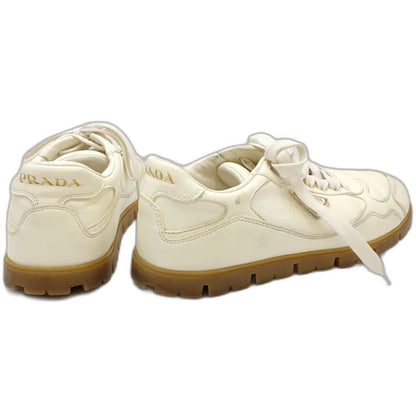 PRADA プラダ スニーカー ローカット トライアングルロゴ 1E709N サイズ38 レザー アイボリー レディース/181981【中古】