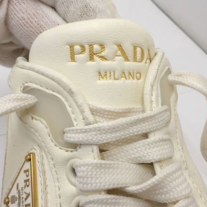 PRADA プラダ スニーカー ローカット トライアングルロゴ 1E709N サイズ38 レザー アイボリー レディース/181981【中古】