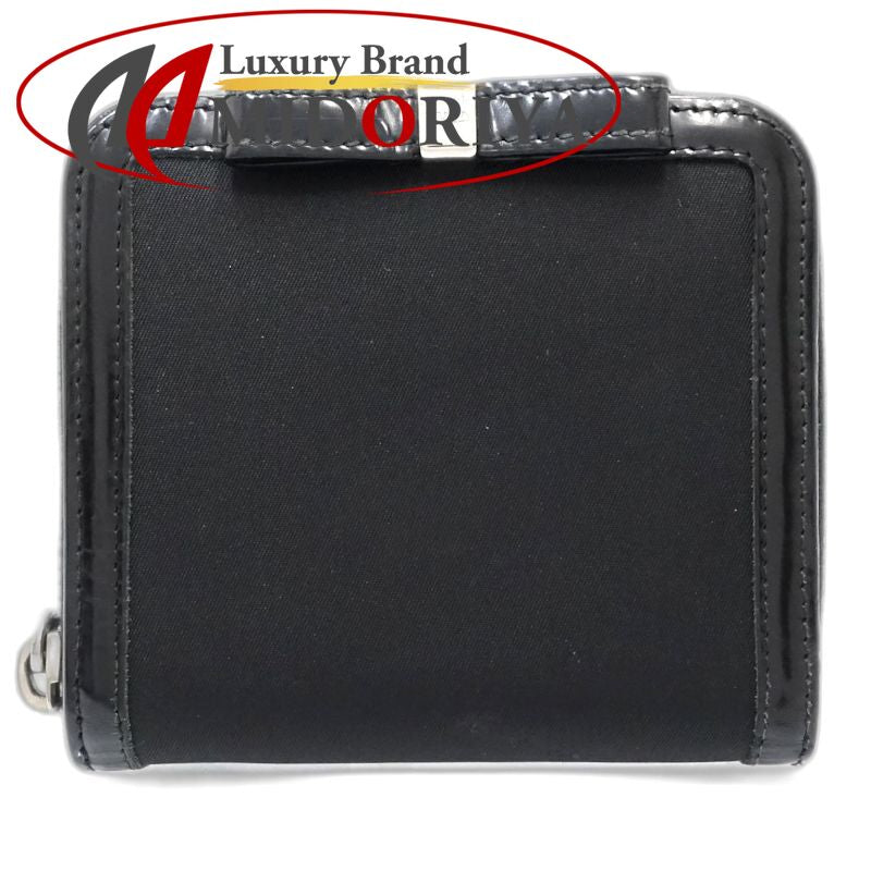 【中古】PRADA プラダ 二つ折り財布 リボン ナイロンxレザー ブラック レディース /181991