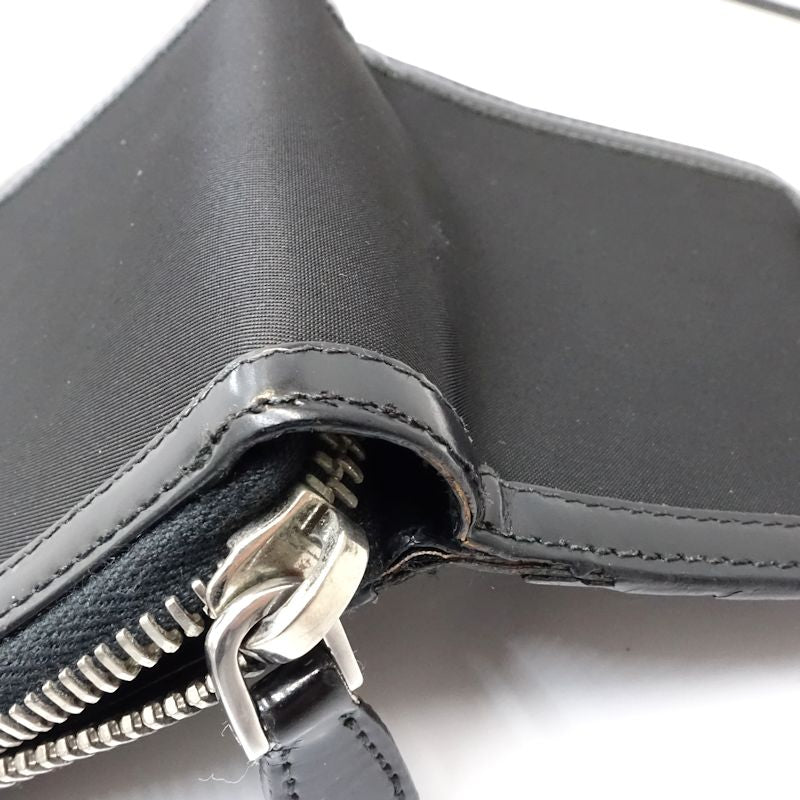 【中古】PRADA プラダ 二つ折り財布 リボン ナイロンxレザー ブラック レディース /181991