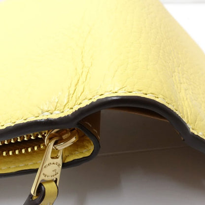 【中古】COACH コーチ 二つ折り財布 ミディアムコーナージップウォレット レザー イエロー レディース /182010