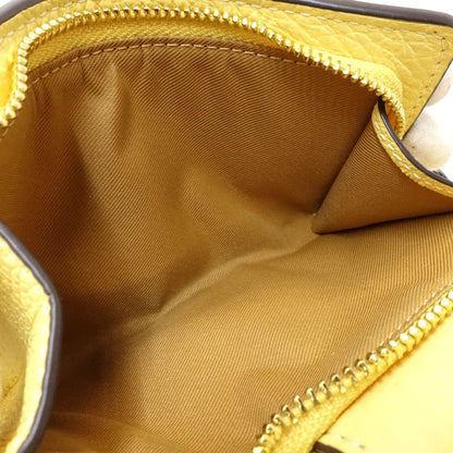 【中古】COACH コーチ 二つ折り財布 ミディアムコーナージップウォレット レザー イエロー レディース /182010